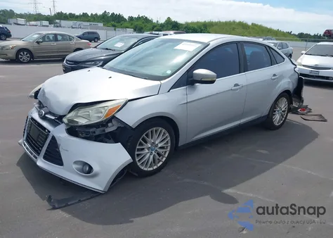 2012 Ford Focus Sel z USA, uszkodzony, nr VIN 1FAHP3H29CL214001